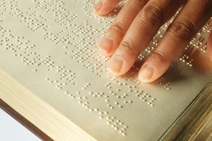 Fingers on Braille book